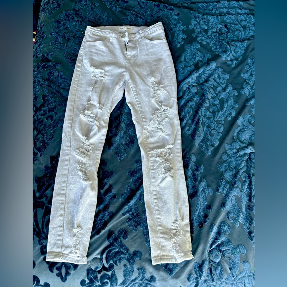 Distressed, straight leg jeans. Brand: Almost Famous